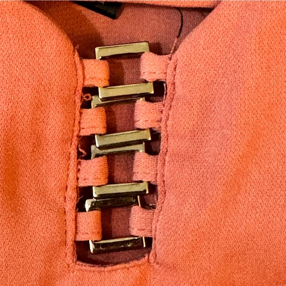 Dynamite Coral Camisole with Strappy Detail

#1251 - Picture 3 of 6